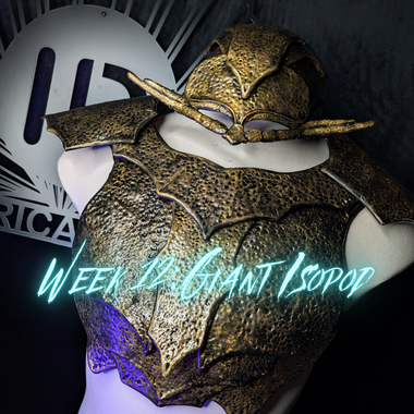 Costume with helmet and chest piece on a dark background with text overlay