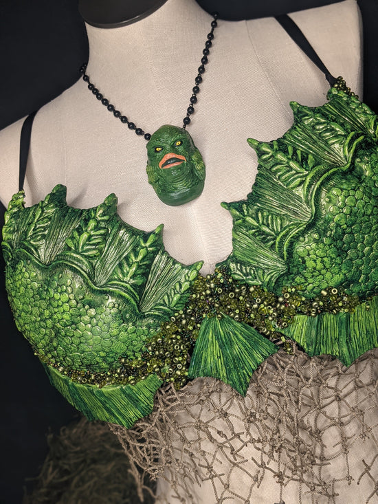 Blank plastic shell set from IDfabrications ID Fabrications for cosplay crafting mermaid tops and merfolk accessories Inspired by the beloved Creature from the Black Lagoon this set has been sculpted to mimic the pebbled shoreline of a dark lake. This set combined with our Tri-Fin set make up our featured Creature from the Black Lagoon Siren Tops.