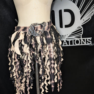 Skirt on a mannequin with a brand logo in the background