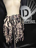 Skirt on a mannequin with a brand logo in the background
