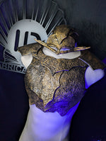 Decorative mask with intricate design on a mannequin against a dark armor set giant isopod from IDfabrications rocks mermaid topbackground