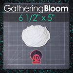 A white sculpted flower decorative piece for mermaid top DIY displayed on a gray gridded cutting mat with large text reading 'GatheringBloom' and '6 1/2" x 5"' at the top, plus an ID Fabrications logo near the bottom.
