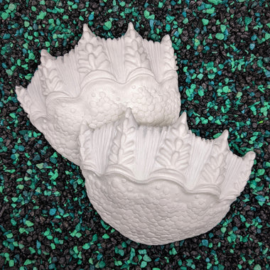 Blank plastic shell set from IDfabrications ID Fabrications for cosplay crafting mermaid tops and merfolk accessories Inspired by the beloved Creature from the Black Lagoon this set has been sculpted to mimic the pebbled shoreline of a dark lake. This set combined with our Tri-Fin set make up our featured Creature from the Black Lagoon Siren Tops.
