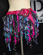 Colorful fringe skirt on a mannequin against a black background mermaid belt ren faire