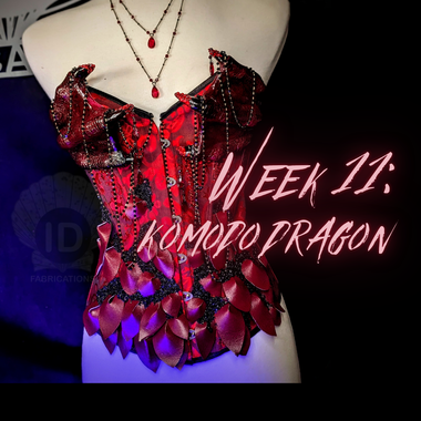 Red dragon-themed costume on a mannequin with 'Week 11: Komodo Dragon' text.
