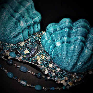 Blank plastic Clam shell set from IDfabrications ID Fabrications for cosplay crafting mermaid tops and merfolk accessories Blue mermaid top seashell top bra